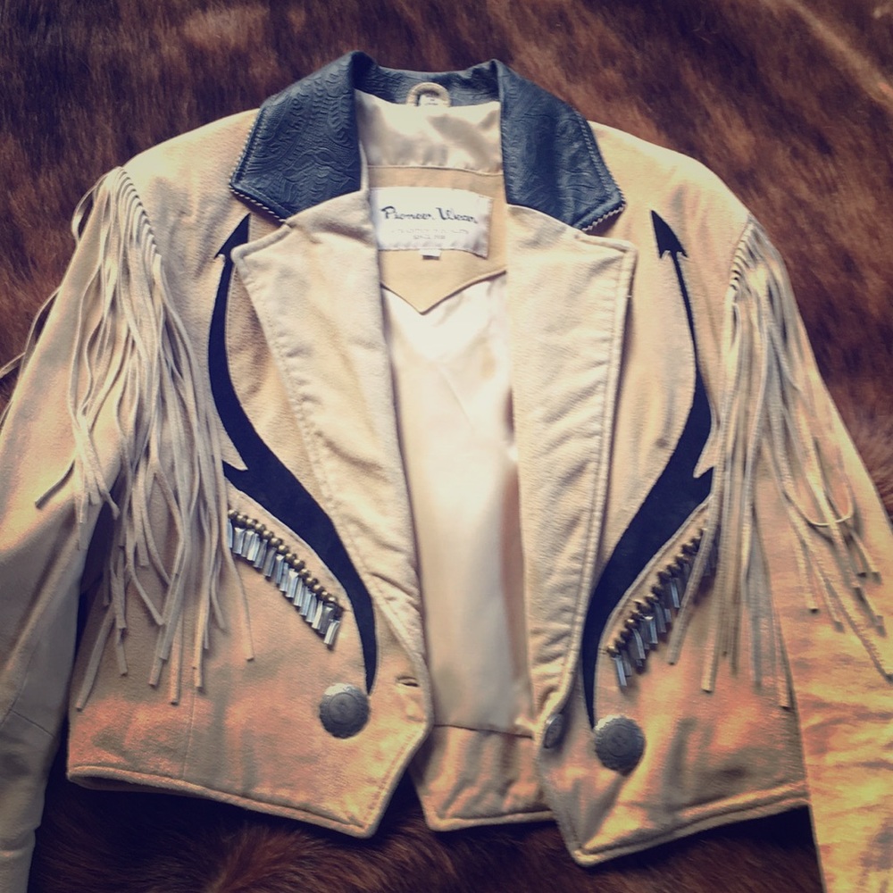 Genuine leather fringe with metal detailing